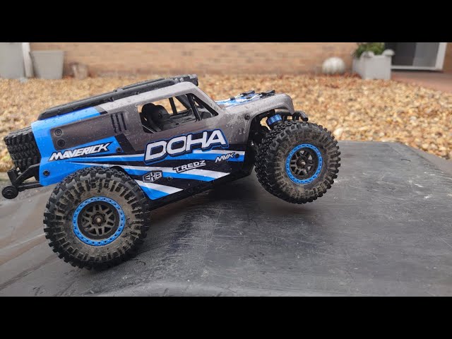Blue ArcaneTCG offroad truck